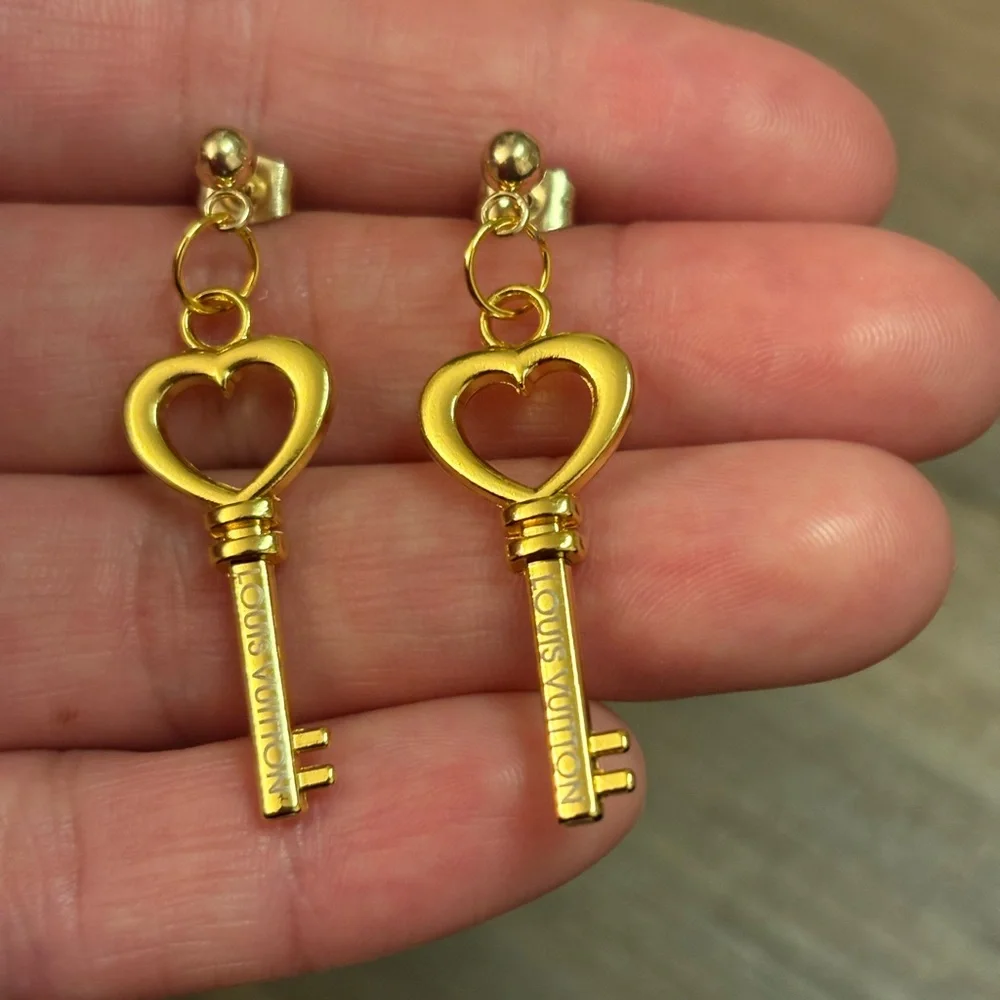 Gold lv earrings
